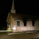 Photo: Mississippi black church burned and spray painted "Vote Trump"