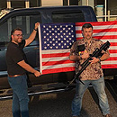 Photo: South Carolina Ford dealership launches 'God, Guns and America' promotion offering a Bible, flag and $400 voucher for an AR-15 with every car sold