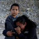 Photo: Reuters photo captures Guatemalan mother begging soldier to let her enter U.S.