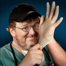 Photo: Insurance Industry Executive Apologizes to Michael Moore