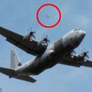 Photo: Retired school teacher captures UFO 'stalking' RAF Hercules on camera