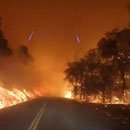 Photo: Motorists desperately try to escape California wildfires that have killed