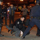 Photo: Police fire tear gas at Oakland, 200 arrested