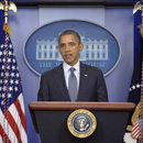 Photo: Obama freezes salaries of some White House aides