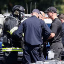 Photo: Employee shoots eight dead at rail yard in San Jose before killing himself: Cops find explosive devices throughout building