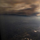 Photo: California's wildfires double in size with tens of thousands forced to flee