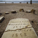 Depleted Texas lakes expose ghost towns, grav