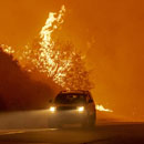 Photo: Tens of thousands without power, hundreds evacuated as new fires erupt in California