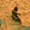 Photo: Female Figure on Mars "Just a Rock"